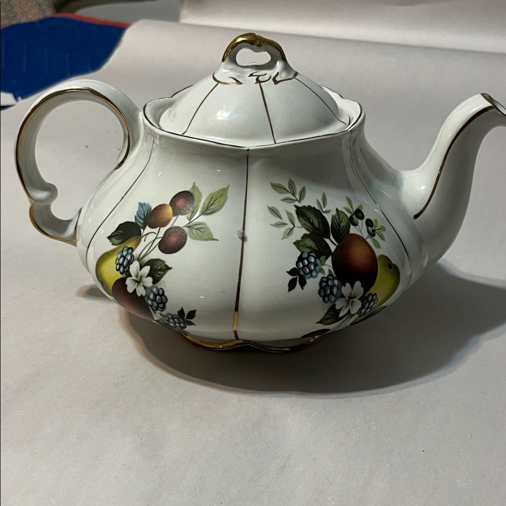 Elegant Floral Teapot with Gold Accents